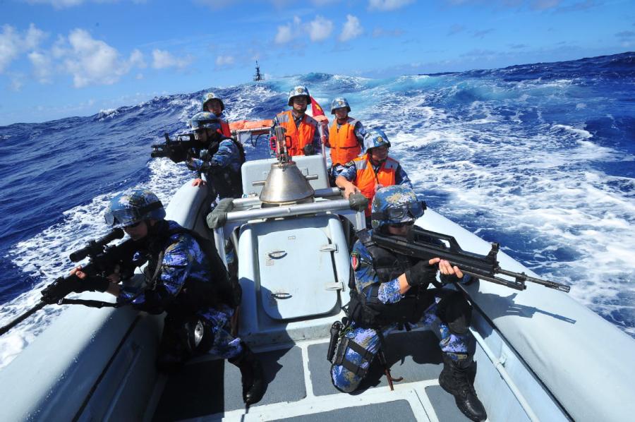 <?php echo strip_tags(addslashes(The special force squad from the PLA Navy destroyer Haikou carries out a simulated rescue mission during the 2014 Rim of the Pacific naval exercise. (HU KAIBING/FOR CHINA DAILY))) ?>