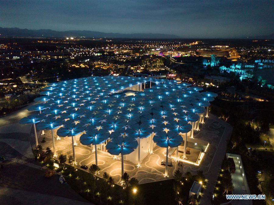 Aerial photo taken on April 19, 2019 shows the night view of the International Pavilion of the 2019 Beijing International Horticultural Exhibition (Expo 2019 Beijing) in Yanqing District of Beijing, capital of China. The 2019 Beijing International Horticultural Exhibition is slated to kick off on April 29, 2019. (Xinhua/Ju Huanzong)