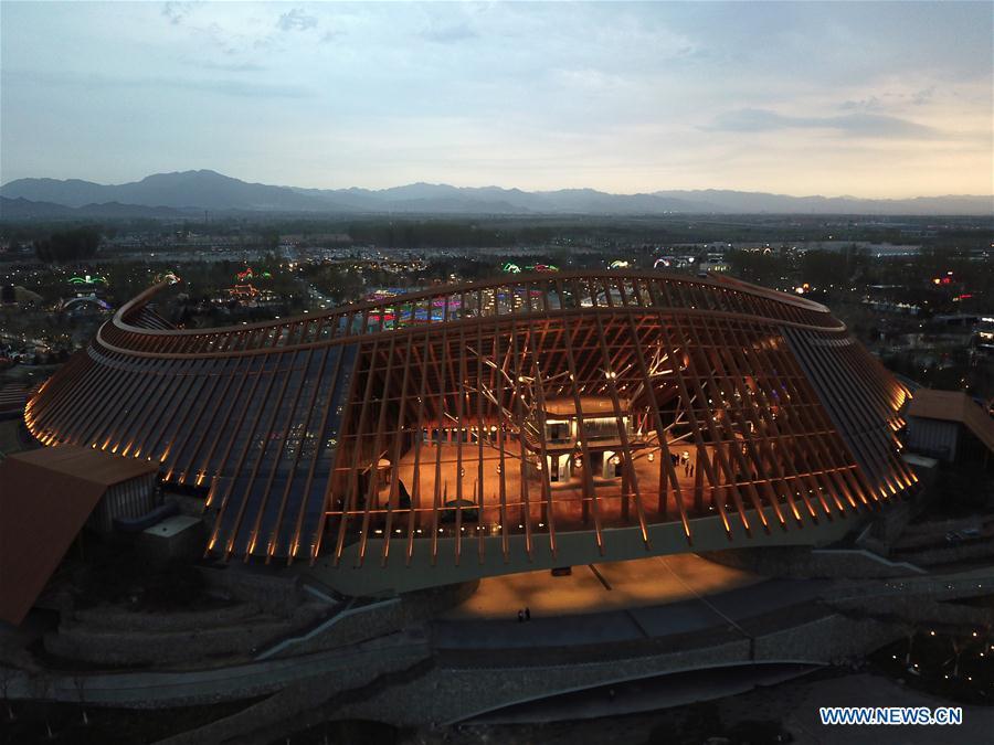 Aerial photo taken on April 19, 2019 shows the night view of the China Pavilion of the 2019 Beijing International Horticultural Exhibition (Expo 2019 Beijing) in Yanqing District of Beijing, capital of China. The 2019 Beijing International Horticultural Exhibition is slated to kick off on April 29, 2019. (Xinhua/Ju Huanzong)