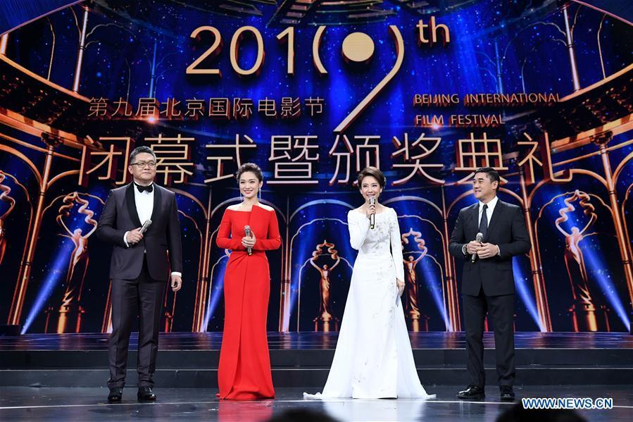 Hosts are seen during the closing and awarding ceremony of the ninth Beijing International Film Festival in Beijing, capital of China, April 20, 2019. (Xinhua/Chen Yehua)
