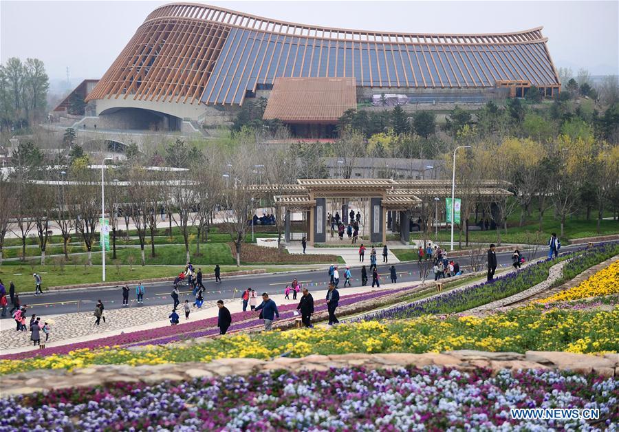 Visitors tour the site of the 2019 Beijing International Horticultural Exhibition (Expo 2019 Beijing) during a trial run in Yanqing District of Beijing, capital of China, April 20, 2019. Beijing on Saturday held a trial opening of the site for the upcoming 2019 Beijing International Horticultural Exhibition to test the reception capacity of the event. About 60,000 people visited the 503-hectare expo site Saturday. (Xinhua/Zhang Chenlin)