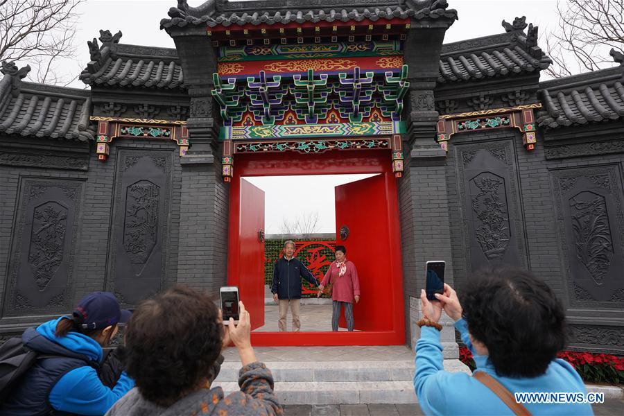 Visitors tour the Shanxi Garden of the 2019 Beijing International Horticultural Exhibition (Expo 2019 Beijing) during a trial run in Yanqing District of Beijing, capital of China, April 20, 2019. Beijing on Saturday held a trial opening of the site for the upcoming 2019 Beijing International Horticultural Exhibition to test the reception capacity of the event. About 60,000 people visited the 503-hectare expo site Saturday. (Xinhua/Ju Huanzong)