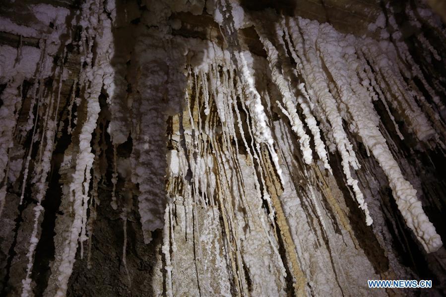 <?php echo strip_tags(addslashes(Salt stalactites are seen in the Malham cave near the Dead Sea in southeastern Israel on April 14, 2019. Israeli and European researchers have discovered the world's deepest salt cave, Malham Cave with a depth of at least 10 kilometers, near the Dead Sea, said a report issued Thursday by the Hebrew University of Jerusalem. The researchers re-measured the 7,000-year-old Malham Cave, near the Dead Sea in southeastern Israel, and found that it is much longer than 5.5 kilometers as previously thought. Thus, the Israeli cave bypasses Iran's Cave of the Three Nudes (3N) on Qeshm Island, which since 2006 has been considered the world's deepest salt cave with a depth of 6.58 kilometers. (Xinhua/Gil Cohen Magen))) ?>
