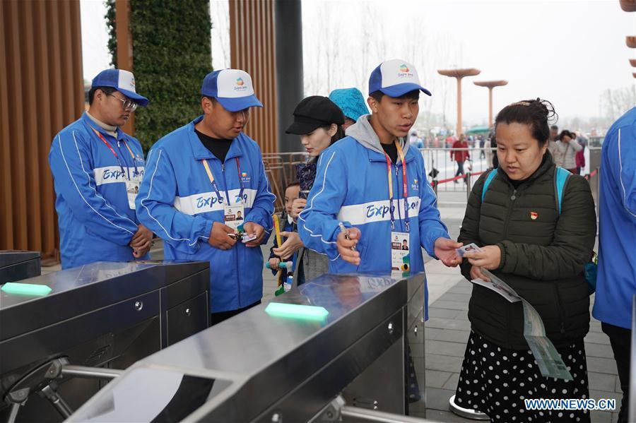<?php echo strip_tags(addslashes(Visitors have their tickets checked at the entrance of the 2019 Beijing International Horticultural Exhibition (Expo 2019 Beijing) during a trial run in Yanqing District of Beijing, capital of China, April 20, 2019. Beijing on Saturday held a trial opening of the site for the upcoming 2019 Beijing International Horticultural Exhibition to test the reception capacity of the event. About 60,000 people visited the 503-hectare expo site Saturday. (Xinhua/Ju Huanzong))) ?>