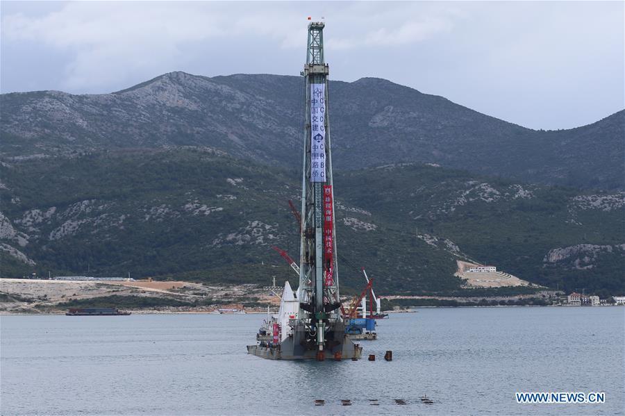 The construction site of the Peljesac Bridge on the Peljesac Peninsula in southern Croatia on April 11, 2019. (Photo/Xinhua)

Peljesac Bridge, Croatia

One of the biggest infrastructure projects in Croatia\'s history, the Peljesac Bridge is designed to link the mainland of Croatia with its southernmost Dubrovnik-Neretva county.

A Chinese consortium led by China Road and Bridge Corporation won the bid for the first phase of the Peljesac Bridge and its access roads in January 2018.

The project, whose estimated value is over 400 million euros ($485 million), will be partially sponsored by European Union funds. Croatian Prime Minister Andrej Plenkovic said in April the 2.4-km-long and 55-meter-high bridge is highly rated by the Croatian people.