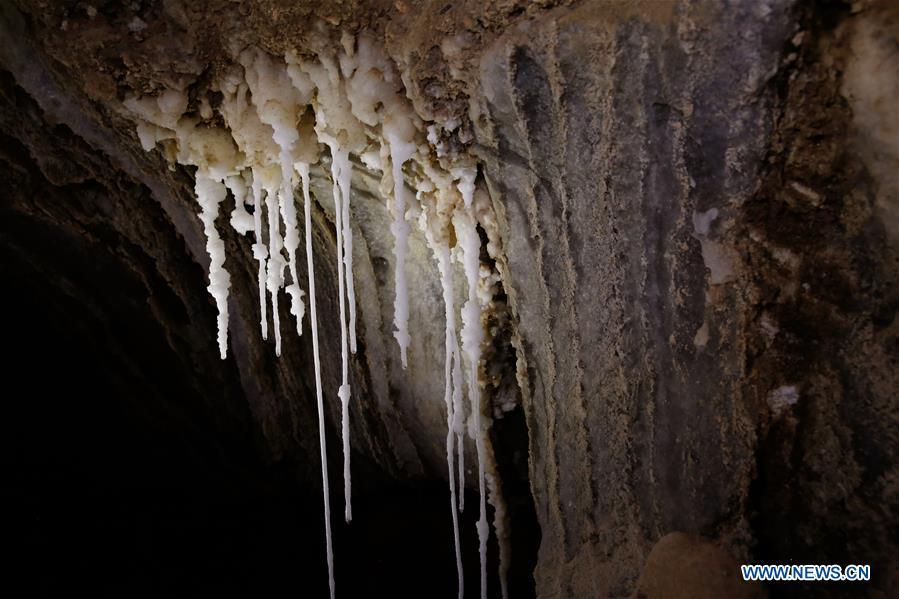 <?php echo strip_tags(addslashes(Salt stalactites are seen in the Malham cave near the Dead Sea in southeastern Israel on April 14, 2019. Israeli and European researchers have discovered the world's deepest salt cave, Malham Cave with a depth of at least 10 kilometers, near the Dead Sea, said a report issued Thursday by the Hebrew University of Jerusalem. The researchers re-measured the 7,000-year-old Malham Cave, near the Dead Sea in southeastern Israel, and found that it is much longer than 5.5 kilometers as previously thought. Thus, the Israeli cave bypasses Iran's Cave of the Three Nudes (3N) on Qeshm Island, which since 2006 has been considered the world's deepest salt cave with a depth of 6.58 kilometers. (Xinhua/Gil Cohen Magen))) ?>