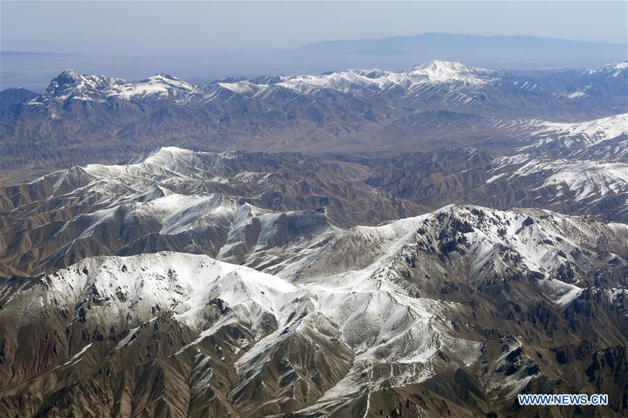 Aerial photo taken on April 21, 2019 shows the snow scenery of Qilian Mountains in northwest China. (Xinhua/Fan Peishen)