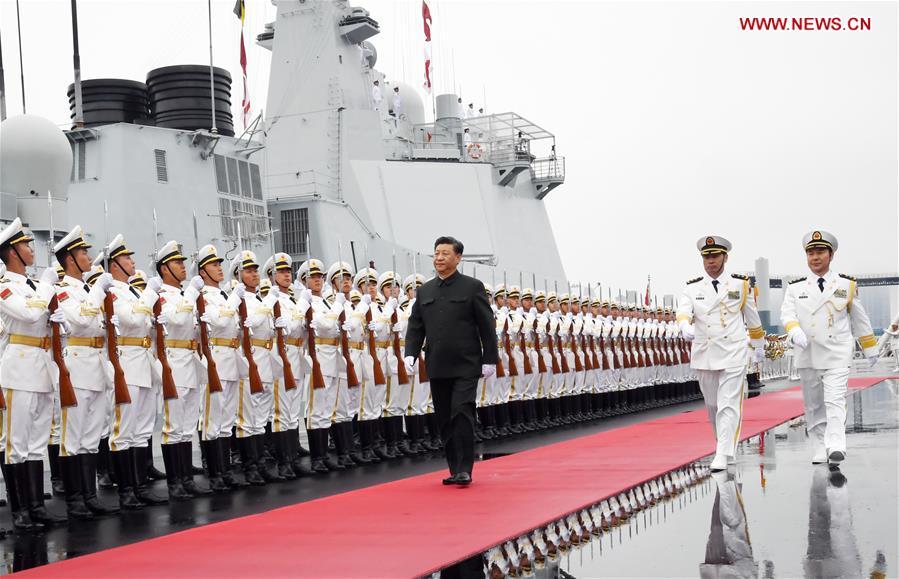 <?php echo strip_tags(addslashes(Chinese President and Central Military Commission Chairman Xi Jinping inspects the honor guards of the Chinese People's Liberation Army (PLA) Navy before boarding the destroyer Xining at a pier in Qingdao, east China's Shandong Province, on April 23, 2019. Xi, also general secretary of the Communist Party of China Central Committee, is here to review a naval parade staged to mark the 70th founding anniversary of the PLA Navy. (Xinhua/Li Gang))) ?>