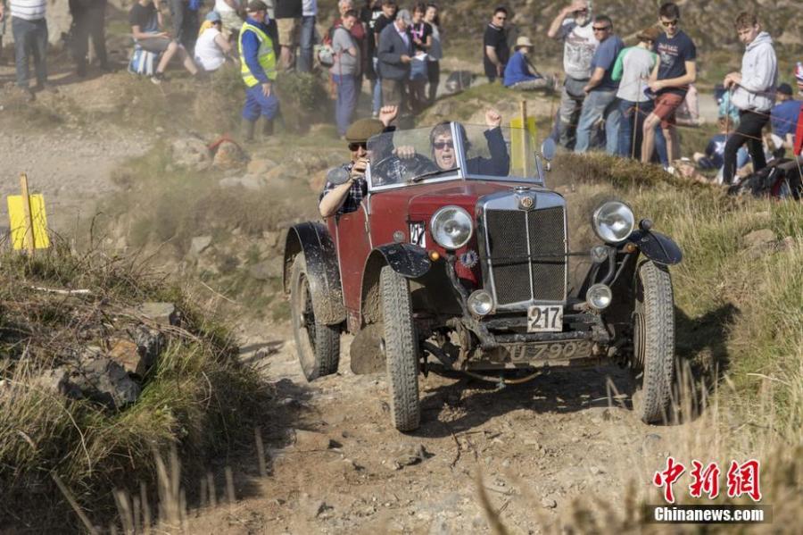 <?php echo strip_tags(addslashes(An antique car competes in the 97th Land's End Trial in Cornwall, England, April 19, 2019. Organized by the Motor Cycling Club, the oldest club of its kind in Britain, the original idea of the competition was to enable motorcyclists to test their endurance skills. (Photo/IC))) ?>