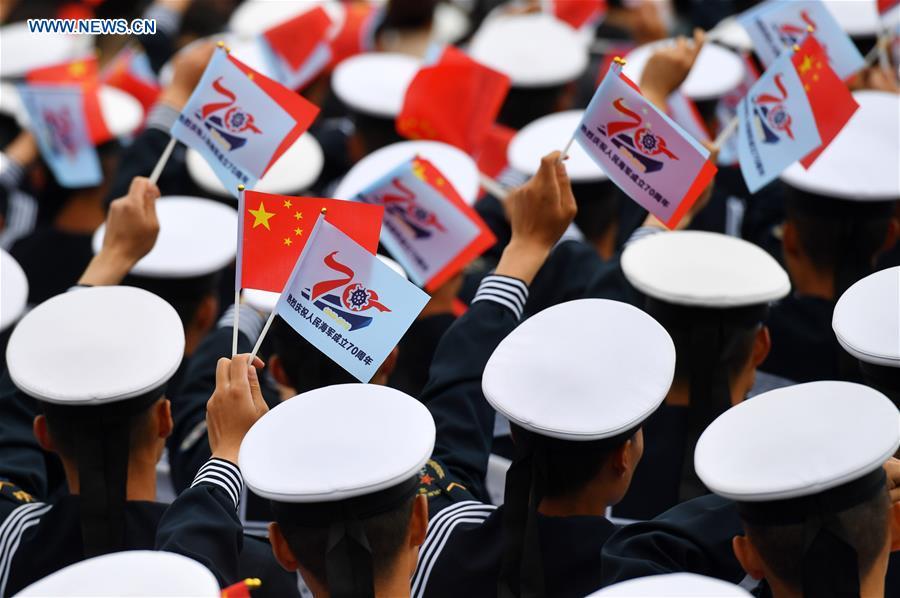 <?php echo strip_tags(addslashes(A joint military music display is held to celebrate the People's Liberation Army Navy's 70th founding anniversary in Qingdao, east China's Shandong Province, April 22, 2019. The military bands from the navies of China, Thailand, Vietnam, Bangladesh and India performed at the event. Over 1,200 people, including officers and soldiers of navy vessels from home and abroad and Qingdao citizens, viewed the performance. (Xinhua/Zhu Zheng))) ?>