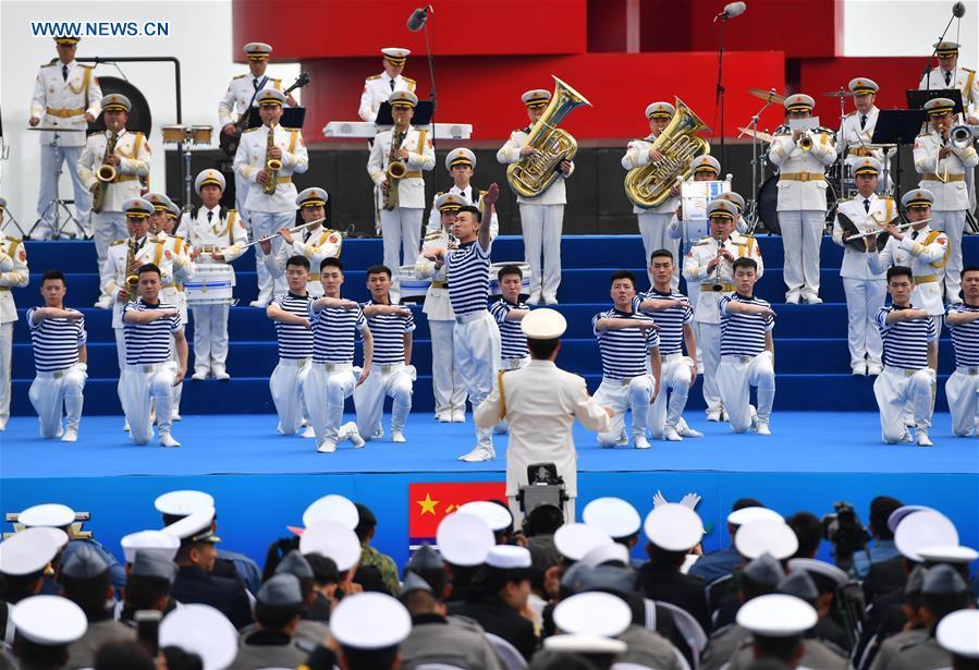 <?php echo strip_tags(addslashes(A joint military music display is held to celebrate the People's Liberation Army Navy's 70th founding anniversary in Qingdao, east China's Shandong Province, April 22, 2019. The military bands from the navies of China, Thailand, Vietnam, Bangladesh and India performed at the event. Over 1,200 people, including officers and soldiers of navy vessels from home and abroad and Qingdao citizens, viewed the performance. (Xinhua/Zhu Zheng))) ?>