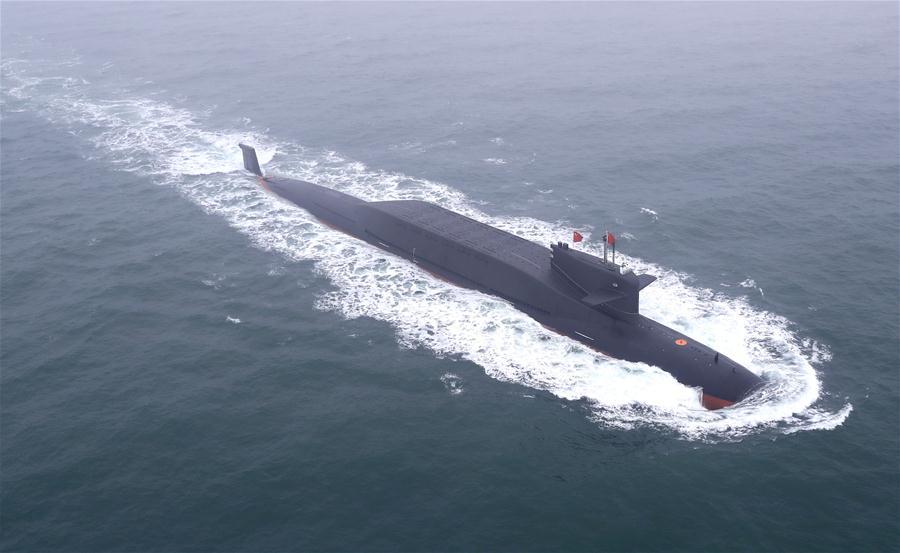 <?php echo strip_tags(addslashes(Aerial photo taken on April 23, 2019 shows a new type of nuclear submarine of the Chinese People's Liberation Army (PLA) Navy on the sea off Qingdao, east China's Shandong Province. (Xinhua/Ju Zhenhua))) ?>