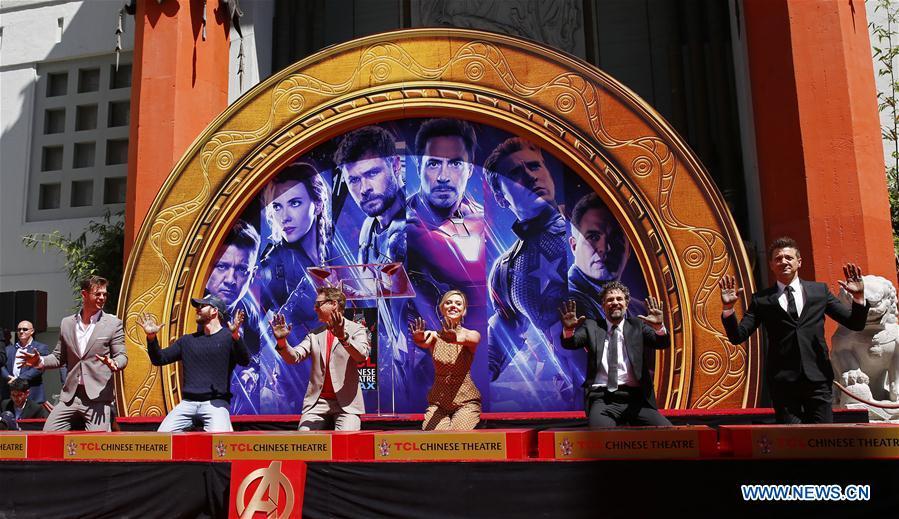 Actors Chris Hemsworth, Chris Evans, Robert Downey Jr., actress Scarlett Johansson, actors Mark Ruffalo, Jeremy Renner (From L to R) attend their print ceremony in the forecourt of the TCL Chinese Theater in Los Angeles, the United States, April 23, 2019. The cast of Marvel Studios \