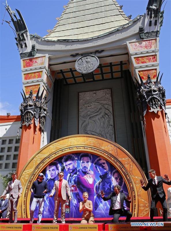 Actors Chris Hemsworth, Chris Evans, Robert Downey Jr., actress Scarlett Johansson, actors Mark Ruffalo, Jeremy Renner (From L to R) attend their print ceremony in the forecourt of the TCL Chinese Theater in Los Angeles, the United States, April 23, 2019. The cast of Marvel Studios \