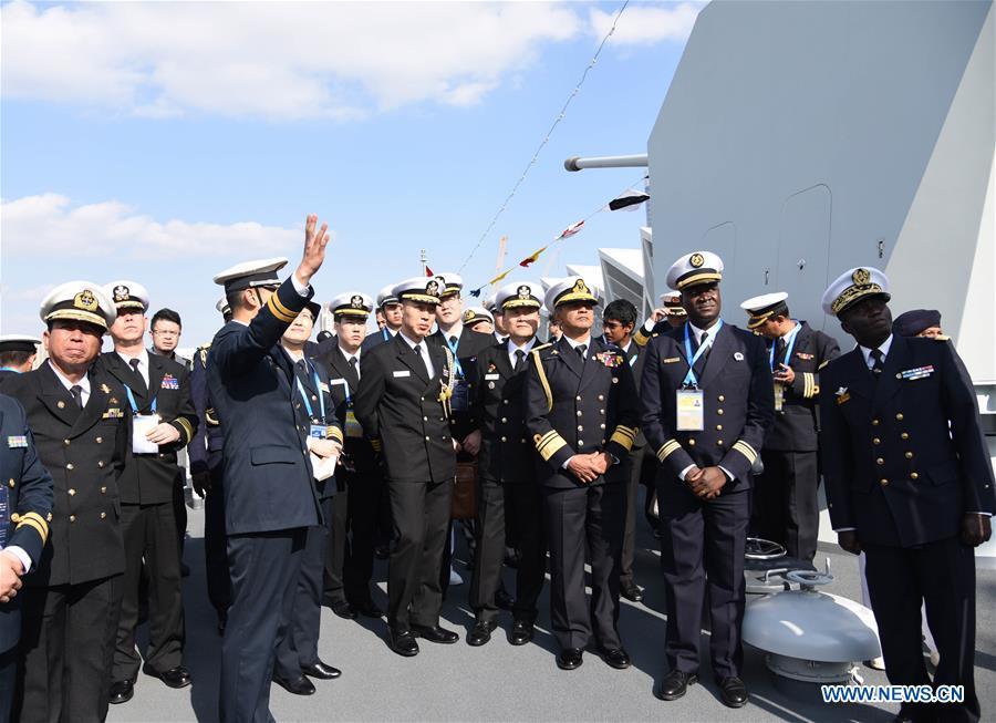 Foreign delegates visit the guided-missile destroyer Guiyang of the Chinese People\'s Liberation Army (PLA) Navy in Qingdao, east China\'s Shandong Province, April 25, 2019. Foreign delegations invited to participate in the multinational naval events marking the 70th anniversary of the founding of the Chinese PLA Navy visited Chinese vessels and communicated with Chinese soldiers and officers on Thursday. (Xinhua/Li Ziheng)