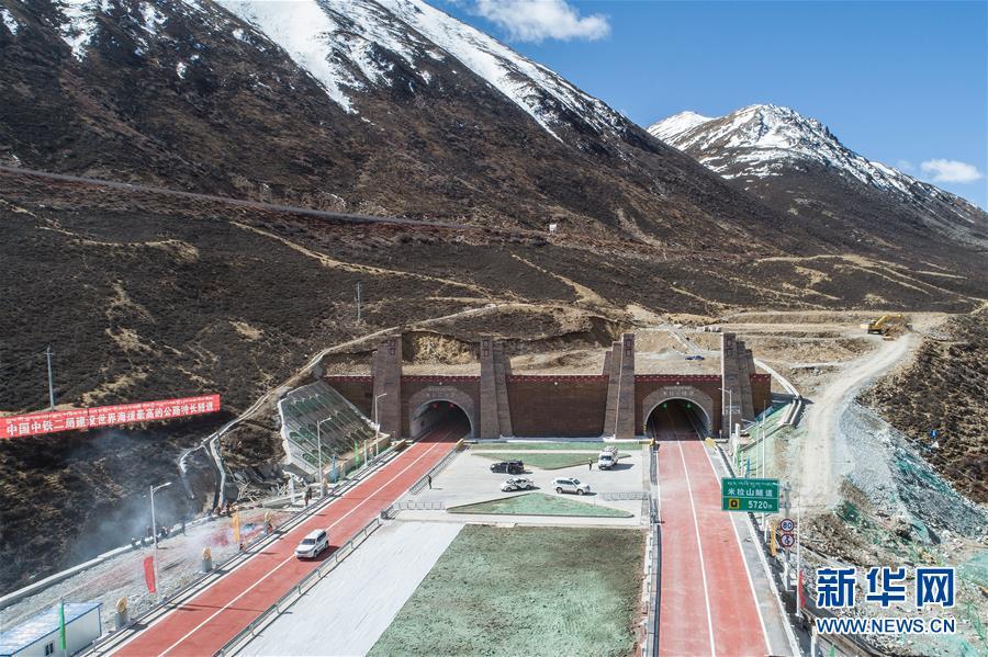 <?php echo strip_tags(addslashes(Aerial photo shows the Mila Mountain Tunnel in Southwest China's Tibet autonomous region, April 26, 2019. The world's highest highway tunnel was open to traffic on Friday at an altitude of over 4,750 meters above sea level in Southwest China's Tibet autonomous region. (Photo/Xinhua))) ?>
