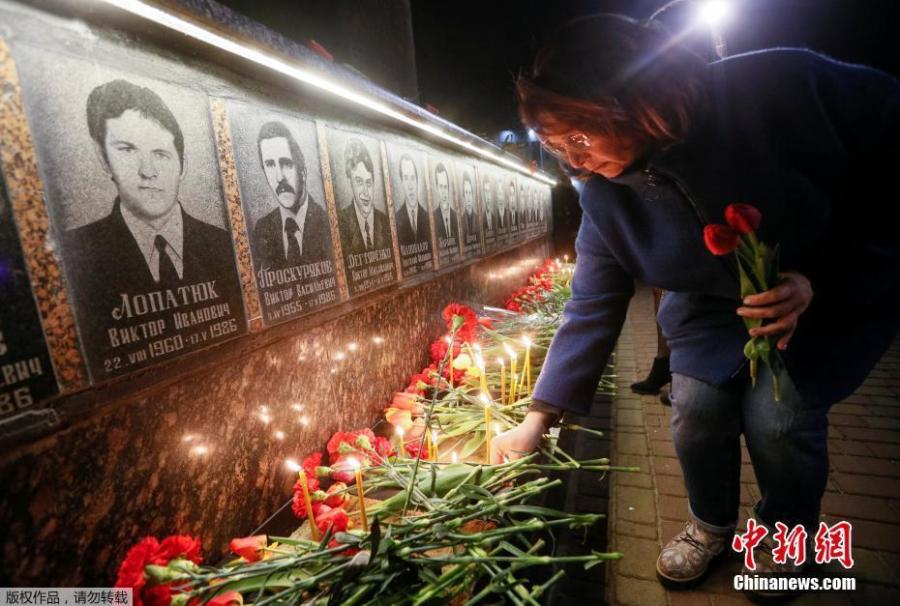 <?php echo strip_tags(addslashes(Ukrainians lay flowers at the memorial for 'liquidators' who died during the cleaning up after the Chernobyl nuclear power plant disaster during a ceremony in Slavutich city, Ukraine, early April 26, 2019. In the early hours of April 26, 1986 the Unit 4 reactor at the Chernobyl power station blew apart. Facing nuclear disaster on unprecedented scale Soviet authorities tried to contain the situation by sending thousands of ill-equipped men into a radioactive maelstrom. The explosion of Unit 4 of the Chernobyl nuclear power plant is still regarded the biggest nuclear accident in the history of nuclear power generation.)) ?>