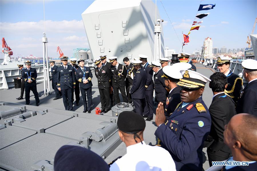 Foreign delegates visit the guided-missile destroyer Guiyang of the Chinese People\'s Liberation Army (PLA) Navy in Qingdao, east China\'s Shandong Province, April 25, 2019. Foreign delegations invited to participate in the multinational naval events marking the 70th anniversary of the founding of the Chinese PLA Navy visited Chinese vessels and communicated with Chinese soldiers and officers on Thursday. (Xinhua/Li Ziheng)