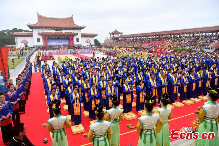 Thousands of people gather for a grand worship ceremony marking the 1,059th birthday of sea goddess Mazu on Meizhou Island in Putian City, East China\'s Fujian Province, April 27, 2019. Mazu is the deified form of Lin Mo, a shaman who lived in the 10th century on Meizhou Island. Revered after her death as a patron of seafarers, including fishermen and sailors, her worship spread throughout China\'s coastal regions and Chinese communities throughout Southeast Asia.  (Photo: China News Service/Lyu Ming)