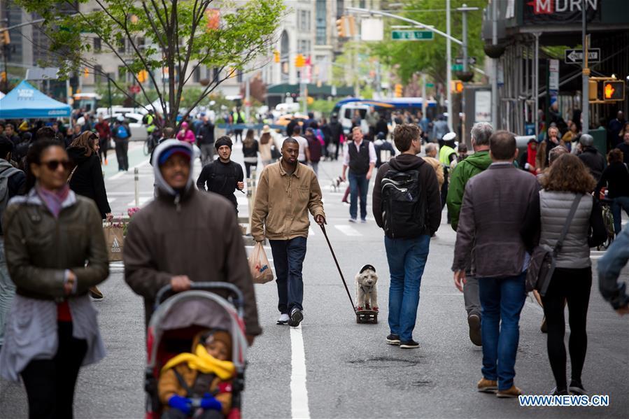 <?php echo strip_tags(addslashes(People walk on Broadway during the Car Free Earth Day 2019 in New York, the United States, April 27, 2019. The annual event was created to help raise awareness about environmentally friendly ways to get around town. (Xinhua/Michael Nagle))) ?>