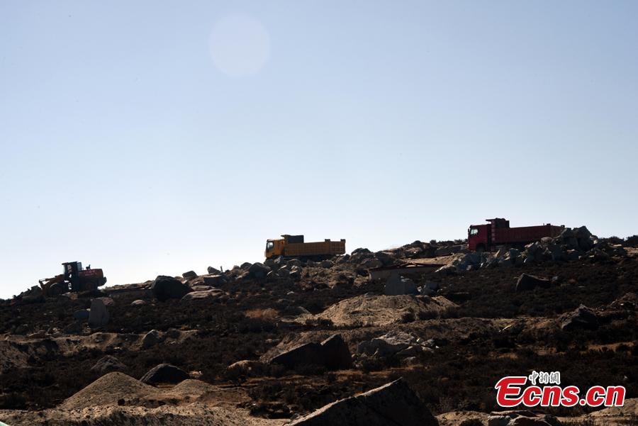 A view of the Large High Altitude Air Shower Observatory (LHAASO) on Haizi Mountain in Daocheng County, Sichuan Province, April 27, 2019. The giant observatory will consist of more than 6,300 detectors, an array of 12 Cherenkov telescopes and three water ponds containing 3,000 detecting units. LHAASO, designed to detect high-energy gamma rays with the utmost sensitivity and accuracy, launched its first set of detectors on Friday, complementing global efforts to decode the origin of cosmic rays. (Photo: China News Service/Sun Zifa)