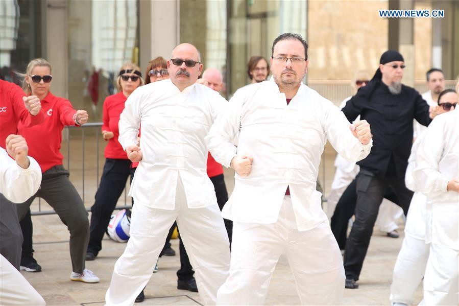 A group of Taiji enthusiasts practice Taiji in Valletta, capital of Malta on April 27, 2019. The World Taiji (Tai Chi) Day was celebrated on Saturday in Valletta, with a series of Chinese Taiji performances. (Xinhua/Yuan Yun)