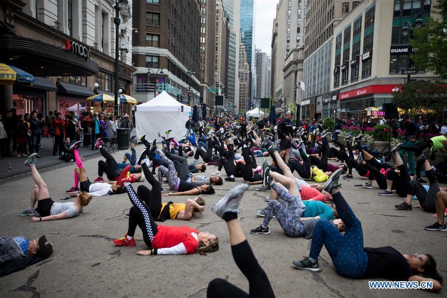 <?php echo strip_tags(addslashes(People participate in an exercise class in Herald Square during the Car Free Earth Day 2019 in New York, the United States, April 27, 2019. The annual event was created to help raise awareness about environmentally friendly ways to get around town. (Xinhua/Michael Nagle))) ?>