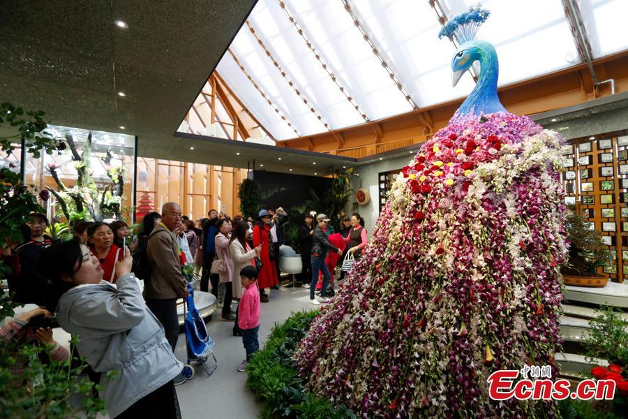<?php echo strip_tags(addslashes(People visit the China Pavilion during the 2019 Beijing International Horticultural Exhibition in Yanqing District of Beijing, China, April 29, 2019. At the center of the expo site stands the Chinese Pavilion, a curved exhibition hall in the shape of a 