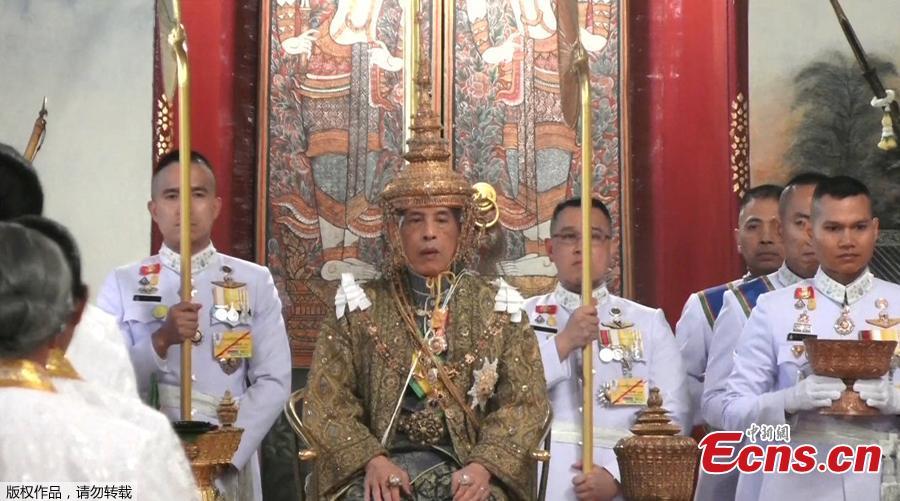 <?php echo strip_tags(addslashes(Thailand's King Maha Vajiralongkorn is crowned during his coronation in Bangkok, Thailand, May 4, 2019 in this still image taken from TV footage. King Vajiralongkorn, 66, became constitutional monarch after the death of his revered father, King Bhumibol Adulyadej, in October 2016 after 70 years on the throne. (Photo/Agencies))) ?>