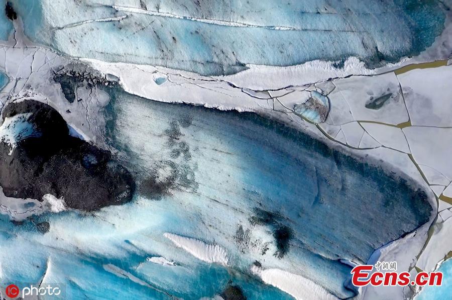<?php echo strip_tags(addslashes(A drone footage shows the breathtaking glacier in Iceland. Italian photographer Stefano Tiozzo, 33, filmed a series of unique aerial images of the Vatnajokull glacier throughout February 2019. It is the largest ice cap in Europe by volume and has a large core measuring almost a kilometre (0.6 miles) in thickness. (Photo/IC))) ?>