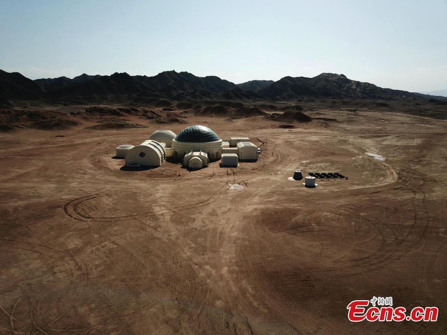 A picture taken with a drone shows an aerial view of the C-Space Project, a Mars simulation base in the Gobi Desert in Jinchang, Gansu Province, China. The C-Space Project Mars Base opened officially on 17 April 2019 with the aim to educate and provide an environment for youths and tourists to experience life on planet Mars. The base occupying an area of 11,996 square feet is situated about 40 kilometers from the town of Jinchang in the Gobi Desert. The location is chosen to simulate the landscape and harsh conditions of living on Mars as much as possible. (Photo/China News Service)
