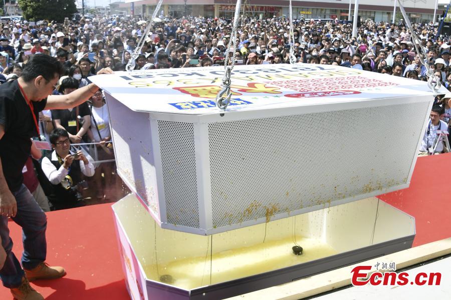 A gigantic box of instant noodles 1,500 times its normal size was cooked in Isesaki, Gunma Prefecture, north of Tokyo, breaking the Guinness World Record for the \