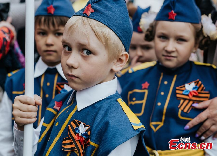 <?php echo strip_tags(addslashes(Children marched through the streets in military uniforms during a parade to celebrate the upcoming 74th Victory Day in Ivanovo, Russia, May 7, 2019. (Photo/VCG))) ?>