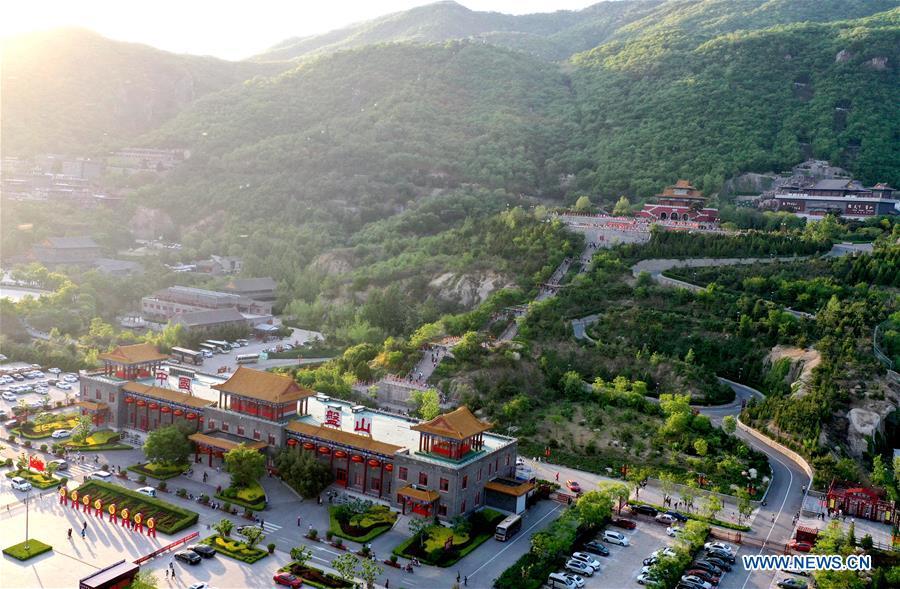Aerial photo taken on May 2, 2019 shows the entrance of Panshan Mountain scenic zone in Jizhou District of Tianjin, north China. May 5 marks the opening of \