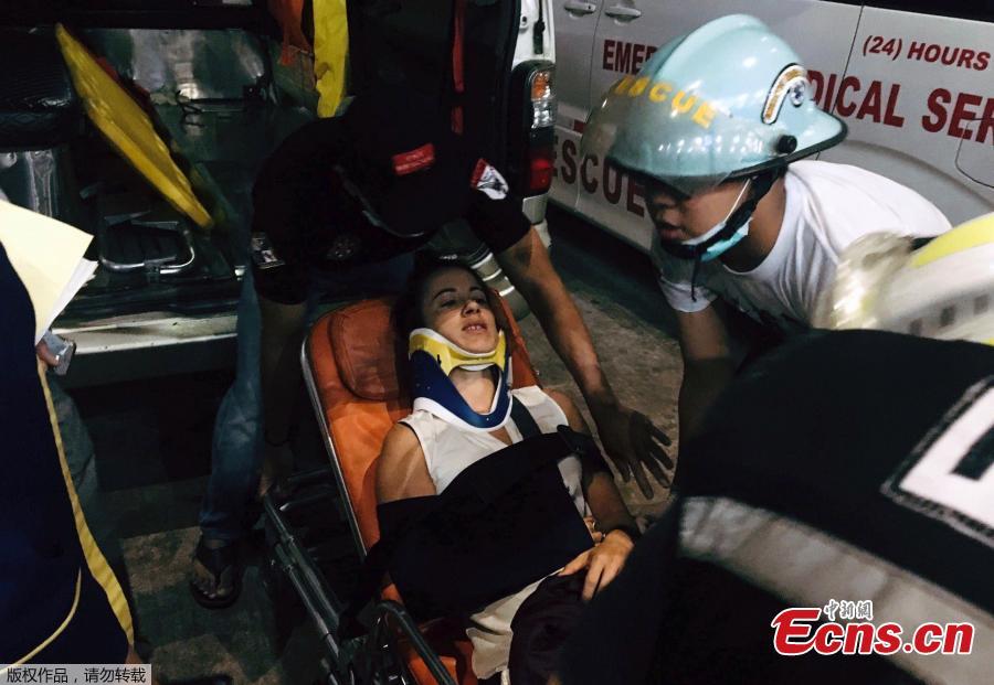 <?php echo strip_tags(addslashes(An injured person is carried on a stretcher at the Yangon International Airport in Yangon, Myanmar, May 8, 2019. Some 18 people including five crew members were injured after a passenger plane of the Biman Bangladesh airlines skidded off the runway at Myanmar's Yangon International Airport (YIA) on Wednesday, said the Department of Civil Aviation Myanmar.  (Photo/Agencies))) ?>