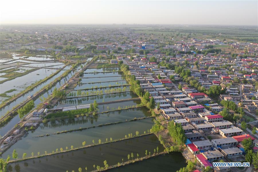 Aerial photo taken on April 30, 2019 shows the Baiyangdian lake in Xiongan New Area, north China\'s Hebei Province. (Xinhua/Xing Guangli)