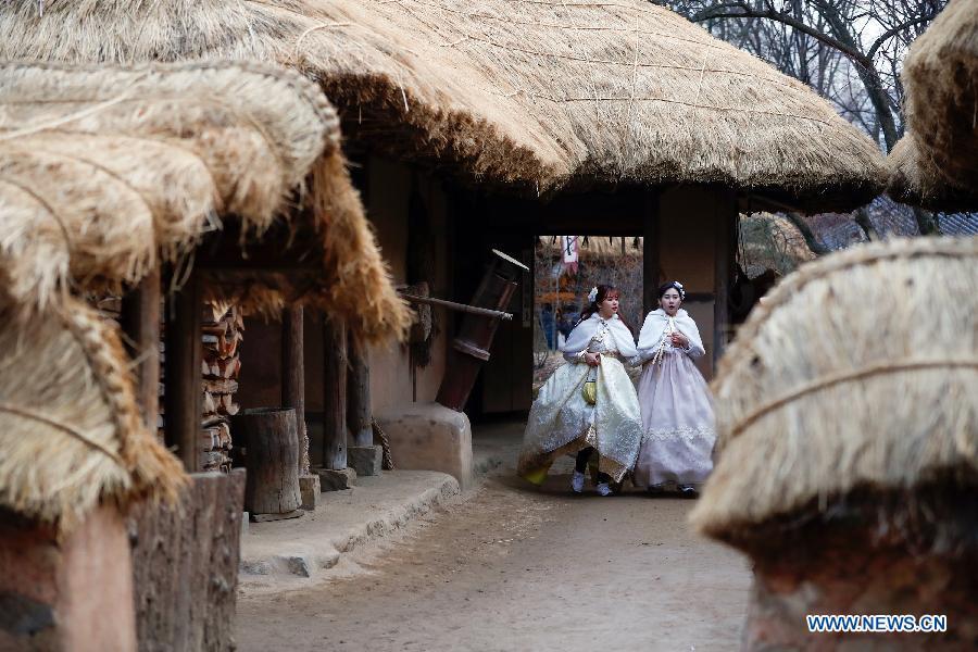 <?php echo strip_tags(addslashes(Tourists dressed in traditional costume visit a folklore-themed village in Yongin, South Korea, Feb. 5, 2019. China will hold the Conference on Dialogue of Asian Civilizations starting from May 15. Under the theme of 