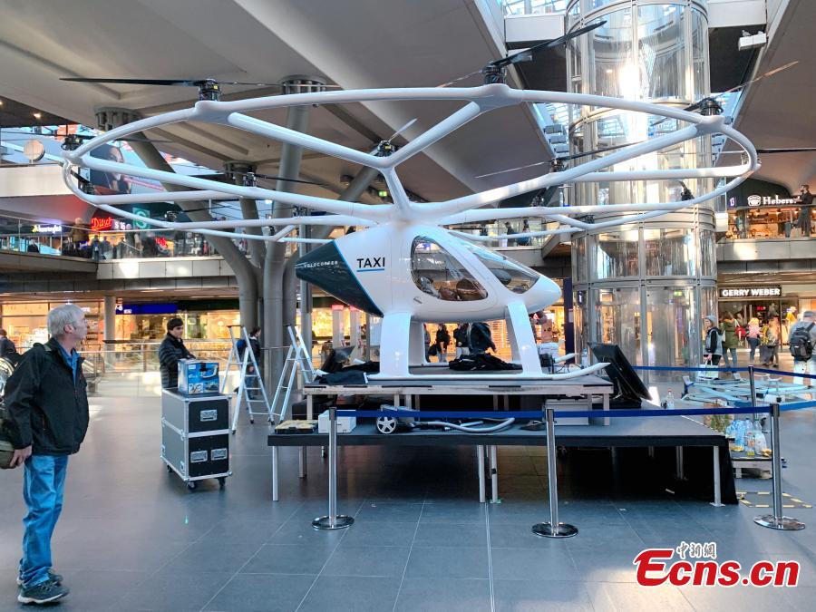 <?php echo strip_tags(addslashes(An air taxi by German company Volocopter is pictured at a railway station in Berlin, Germany, May 12, 2019. Volocopter has announced plans to explore the market in Singapore and look to cooperate with other companies in Germany. (Photo: China News Service/Peng Dawei))) ?>