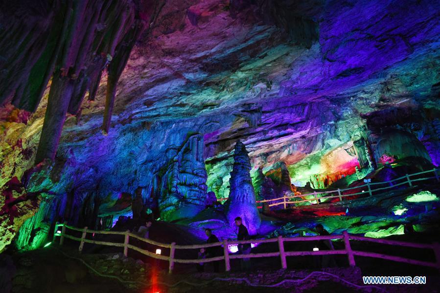 <?php echo strip_tags(addslashes(Tourists view Wanxiang karst cave in Hanwang Township of Longnan City, northwest China's Gansu Province, May 13, 2019. (Xinhua/Ma Ning))) ?>