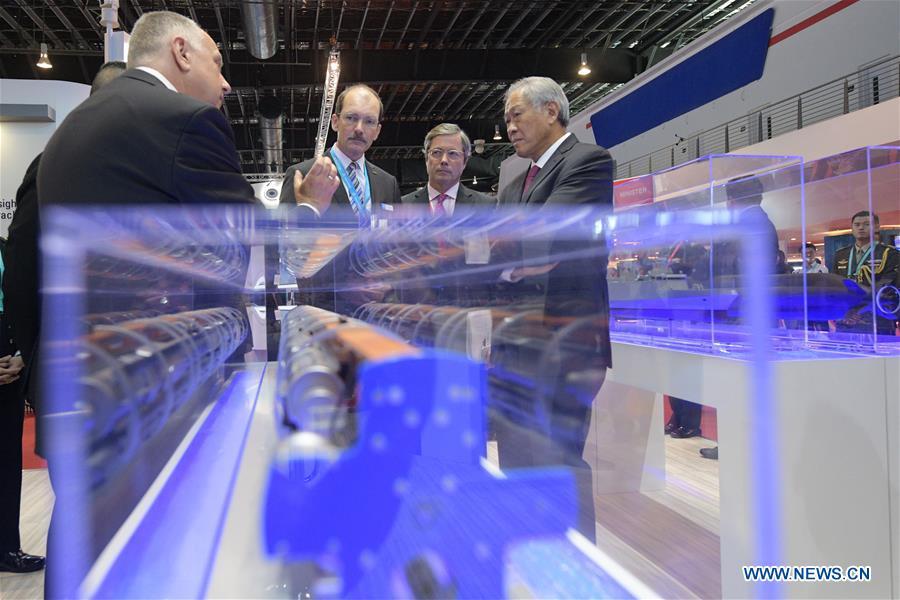 <?php echo strip_tags(addslashes(Singapore Defense Minister Ng Eng Hen (1st R) is seen at the 12th International Maritime Defense Exhibition and Conference (IMDEX Asia) held in Singapore's Changi Exhibition Centre on May 14, 2019. Singapore Defense Minister Ng Eng Hen welcomed here Tuesday foreign navies attending the 12th International Maritime Defense Exhibition and Conference (IMDEX Asia) at its opening ceremony. A total of 23 warships from 15 countries sailed their way to IMDEX Asia at the Changi Naval Base, together with 26 chiefs of defense forces and navies, vice chiefs, directors-general of coast guards and senior naval officers. (Xinhua/Then Chih Wey))) ?>