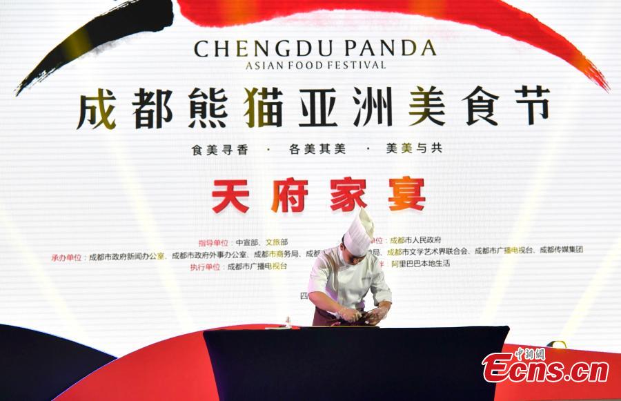 <?php echo strip_tags(addslashes(Photo taken on May 14, 2019 shows the Chengdu Panda Asian Food Festival held in Chengdu City, Sichuan Province. Two hundred guests from many countries and regions were invited to enjoy the Tianfu Family Banquet that included 16 signature Sichuan dishes. Sichuan food has a long history and is known as one of the four major Chinese cuisines. The province also has the reputation of “Tian Fu Zhi Guo,” a place richly endowed with natural resources. The festival is part of the Conference on Dialogue of Asian Civilizations held in Beijing. (Photo: China News Service/An Yuan))) ?>