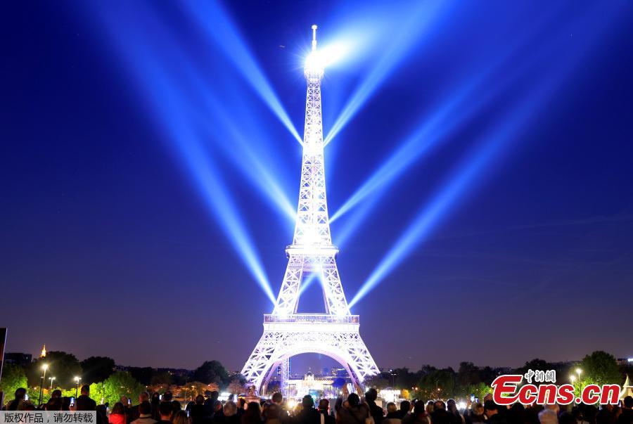 <?php echo strip_tags(addslashes(The Eiffel tower is illuminated during a light show to celebrate its 130th anniversary in Paris, France, May, 15, 2019. (Photo/Agencies))) ?>