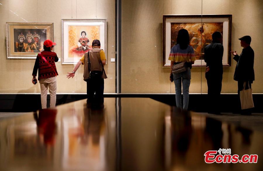 <?php echo strip_tags(addslashes(Photo taken on May 16, 2019 shows an exhibition of intangible cultural heritages from Asia at the National Library of China in Beijing as part of the ongoing Conference on Dialogue of Asian Civilizations. More than 60 craftsmen from 13 Asian countries and regions are displaying traditional works such as puppets from Sri Lanka, Persian carpets from Iran and costumes from the Philippines. (Photo: China News Service/Du Yang))) ?>