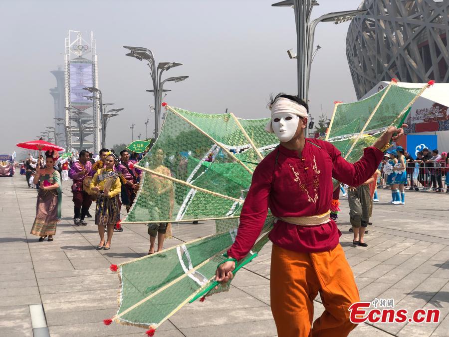 A parade in honor of Asian civilizations held in Beijing, May 16, 2019. The parade includes performing teams dressed in grand festival costumes from 16 countries as well 28 domestic teams. Continuing until May 22, the parade is part of the ongoing Conference on Dialogue of Asian Civilizations in Beijing. (Photo: China News Service/Fu Tian)