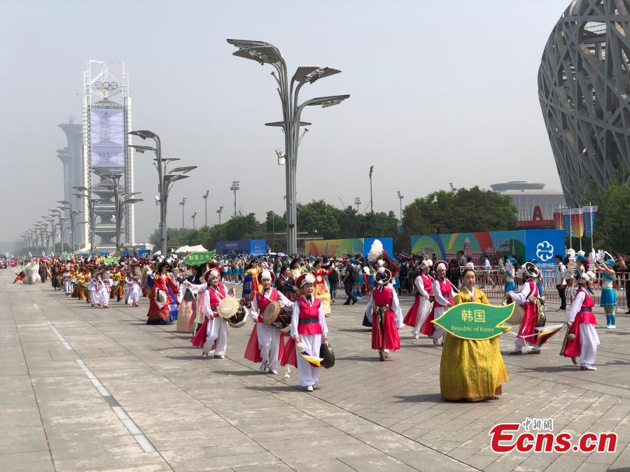 A parade in honor of Asian civilizations held in Beijing, May 16, 2019. The parade includes performing teams dressed in grand festival costumes from 16 countries as well 28 domestic teams. Continuing until May 22, the parade is part of the ongoing Conference on Dialogue of Asian Civilizations in Beijing. (Photo: China News Service/Fu Tian)