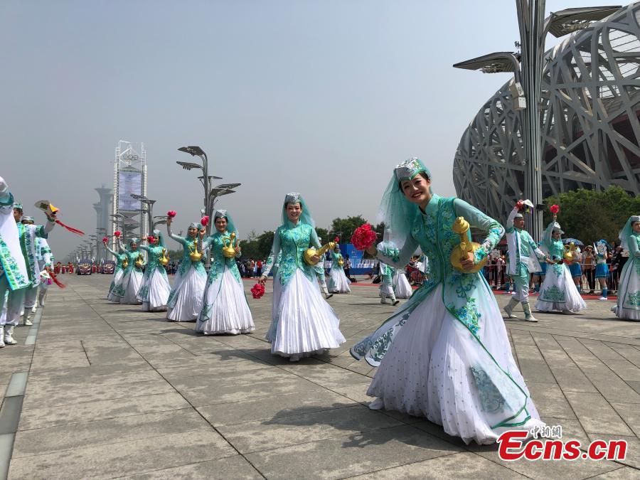 A parade in honor of Asian civilizations held in Beijing, May 16, 2019. The parade includes performing teams dressed in grand festival costumes from 16 countries as well 28 domestic teams. Continuing until May 22, the parade is part of the ongoing Conference on Dialogue of Asian Civilizations in Beijing. (Photo: China News Service/Fu Tian)