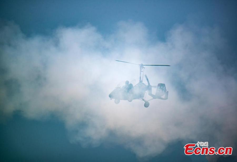 The 2019 World Fly-in Expo (WFE) featuring 560 aircrafts opened on May 18, 2019 in Wuhan, capital of central China\'s Hubei Province. The WFE, which runs until Wednesday, is hosted by the World Air Sports Federation. The Expo features aerial flight performance, aerial sports events, static exhibition and conference forum.The four-day event has attracted 560 aircrafts, with about 100 taking part in the exhibition, according to the organizers.(Photo: China News Service/Zhao Guangliang)