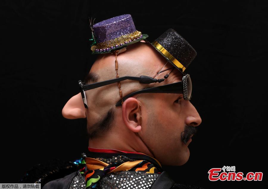<?php echo strip_tags(addslashes(A participant of the international World Beard and Moustache Championships poses before taking part in one of the 17 categories of beard and moustache styles competing in Antwerp, Belgium May 18, 2019.(Photo/Agencies))) ?>
