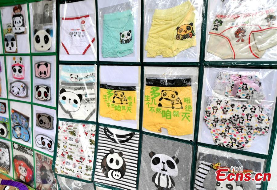 <?php echo strip_tags(addslashes(Collector Li Zhiqi shows his collection of giant panda-themed items in Fuzhou City, Fujian Province, May 21, 2019. Li has amassed a trove of nearly 10,000 items featuring the iconic bear, including stamps, dolls, bookmarks, and mugs. (Photo: China News Service/Lyu Ming))) ?>