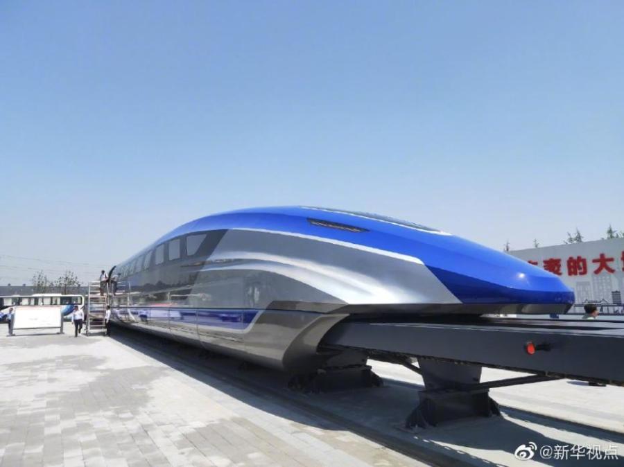 <?php echo strip_tags(addslashes(China rolled off production line a prototype magnetic-levitation train with a top speed of 600 km per hour in the eastern city of Qingdao on May 23, 2019. The debut of China's first high-speed maglev train testing prototype marks a major breakthrough for the country in high-speed maglev transit system. (Photo/Xinhua))) ?>